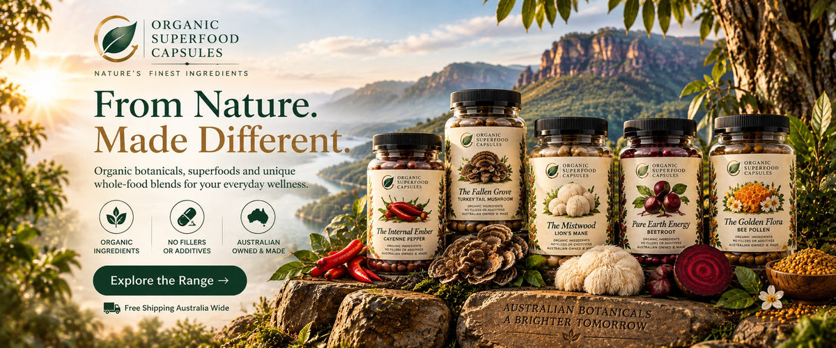 A promotional outdoor-style product shot for Organic Superfood Capsules showing several supplement jars arranged on a stone surface with mountains and trees in the background. The jars are labeled with product names such as Red Chili Powder, Garlic, Mushrooms, Berries, and Turmeric.