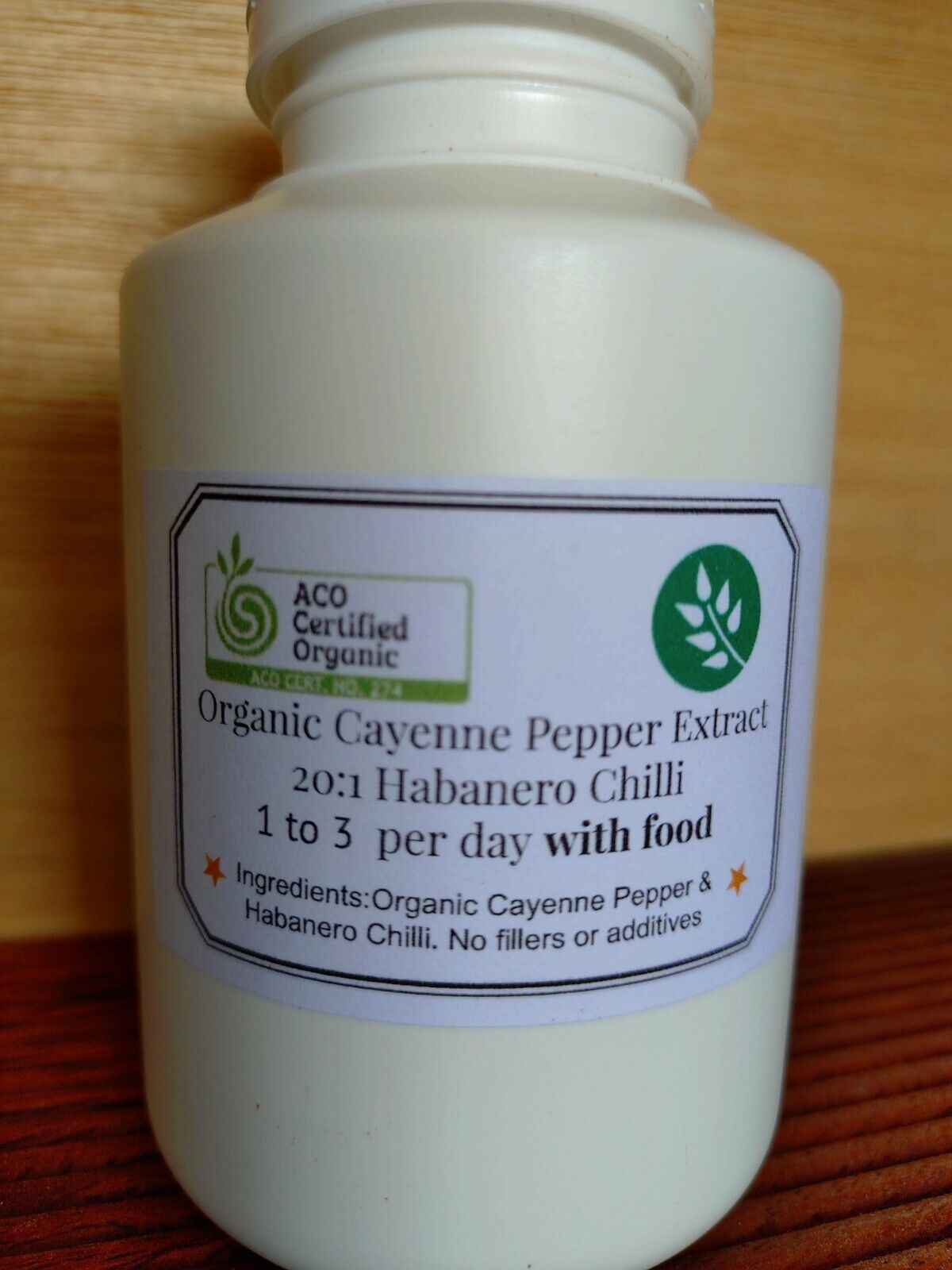 Organic Cayenne & Habanero Pepper capsules in a bottle