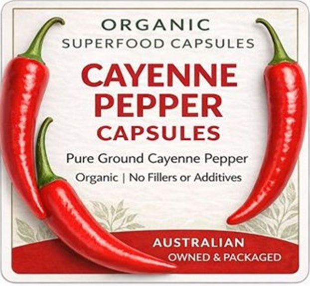 Pack of organic cayenne pepper capsules with red peppers on a white background